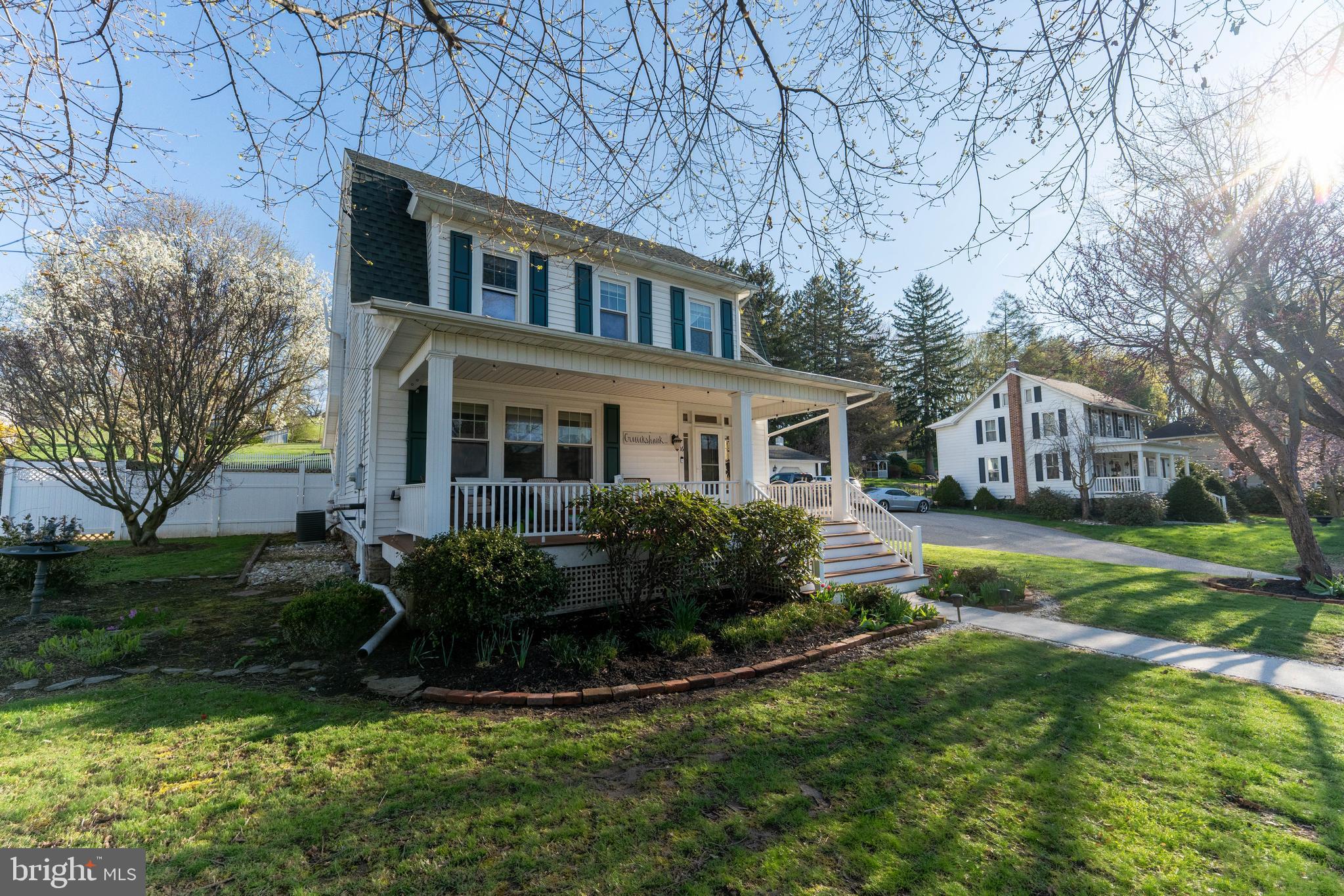 16 Main Street Felton, PA 17322 - Photo 5 of 34 a front view of a house with a yard and trees