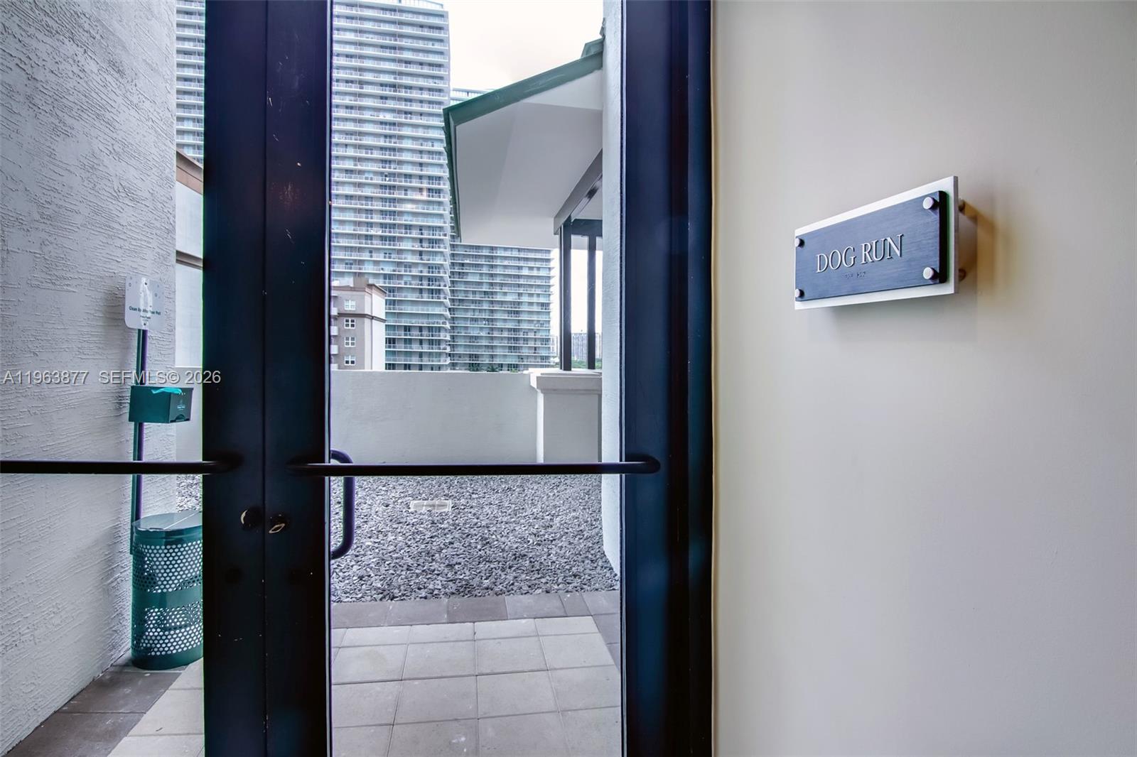 999 Southwest 1st Avenue, Unit 2303 Miami, FL 33130 - Photo 26 of 44 a view of a hallway with seating area
