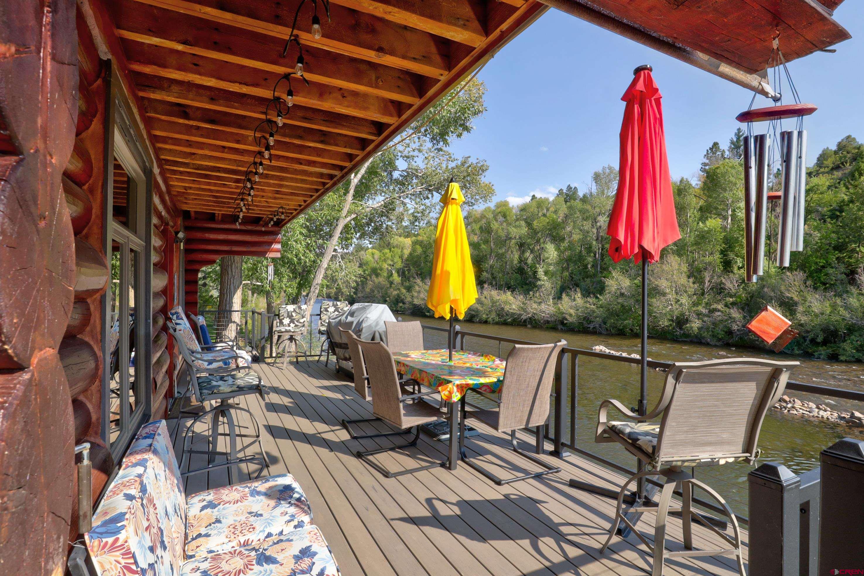 18656 Highway 145 Dolores, CO 81323 - Photo 30 of 45 Wooden terrace featuring outdoor dining space