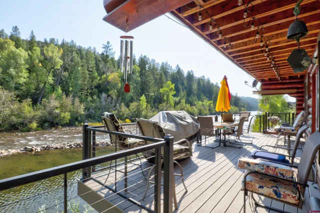 a backyard of a house with lots of green space and garden