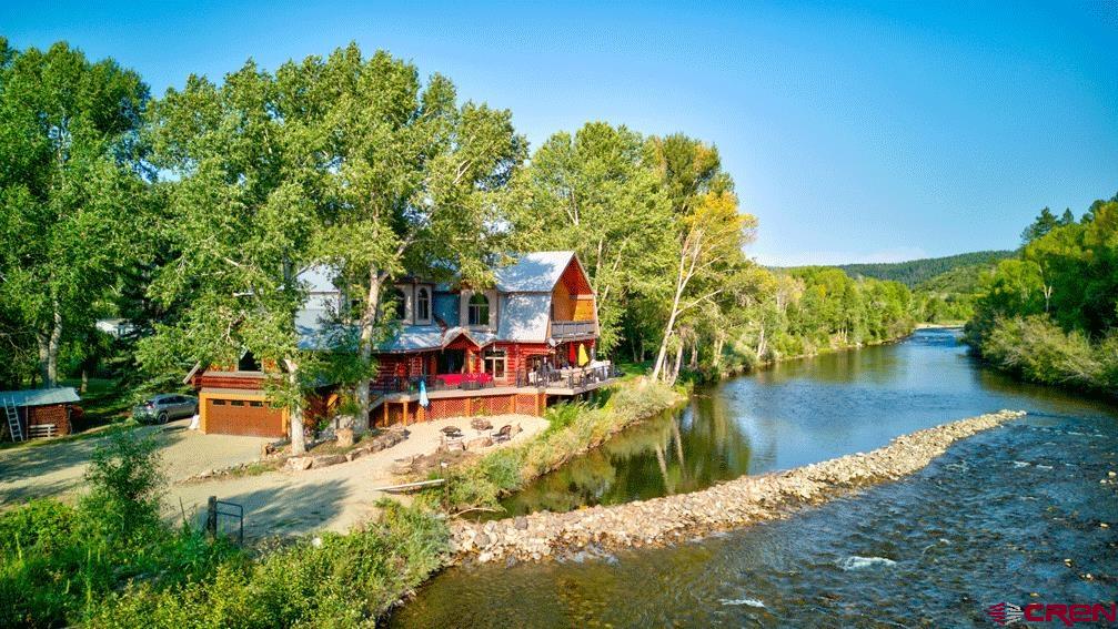 18656 Highway 145 Dolores, CO 81323 - Photo 37 of 45 Exterior space with a wooded view