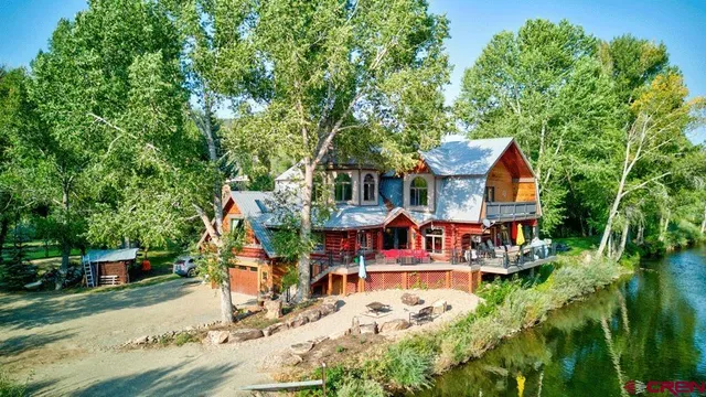a view of a house with a mountain in the background