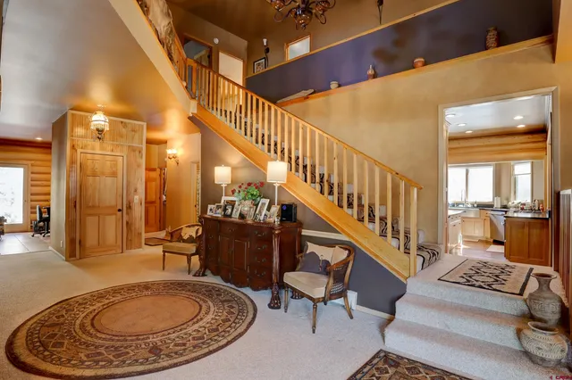 a view of entryway livingroom and hall