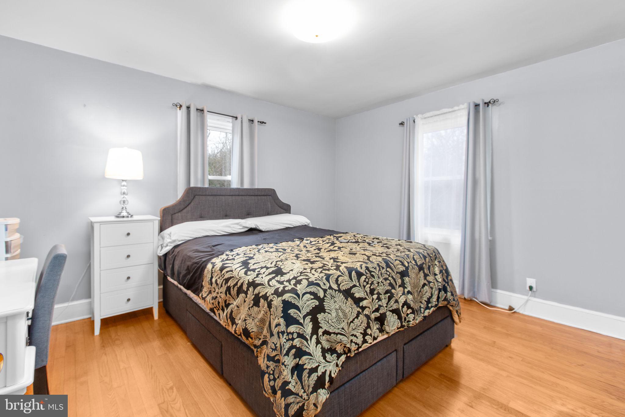 80 Ferry Road Fredericksburg, VA 22405 - Photo 12 of 39 a bedroom with a bed and window