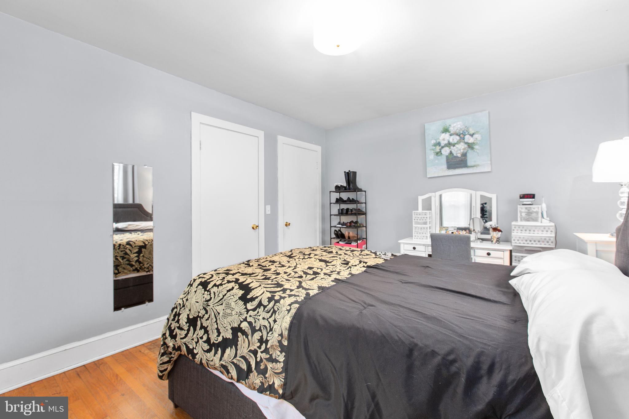 80 Ferry Road Fredericksburg, VA 22405 - Photo 14 of 39 a bedroom with bed and wooden floor