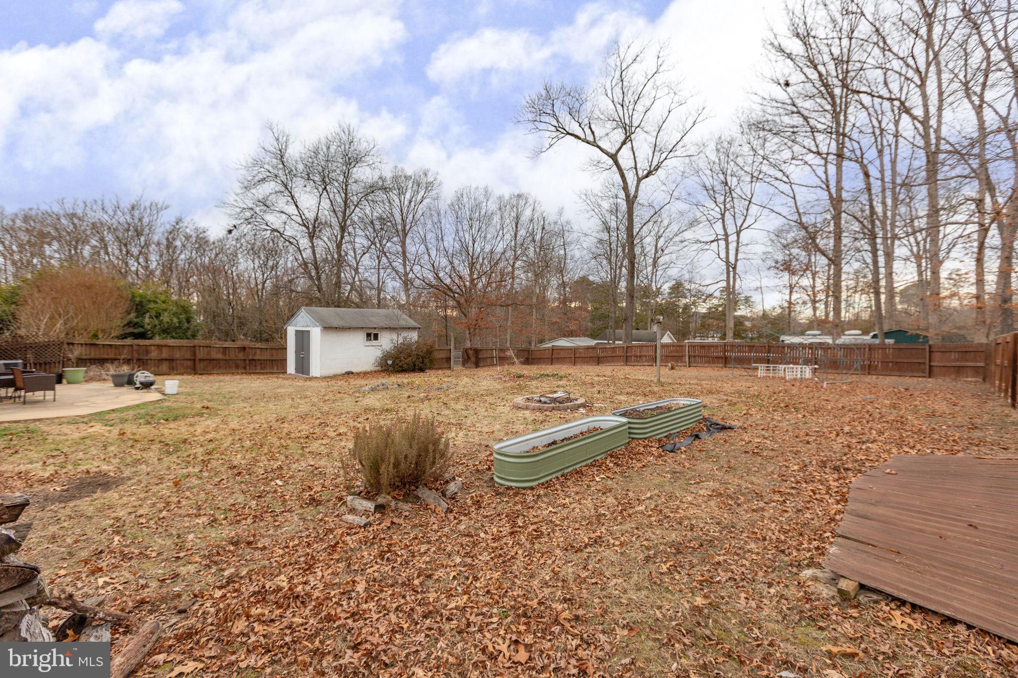 80 Ferry Road Fredericksburg, VA 22405 - Photo 35 of 39 a backyard of a house with trees