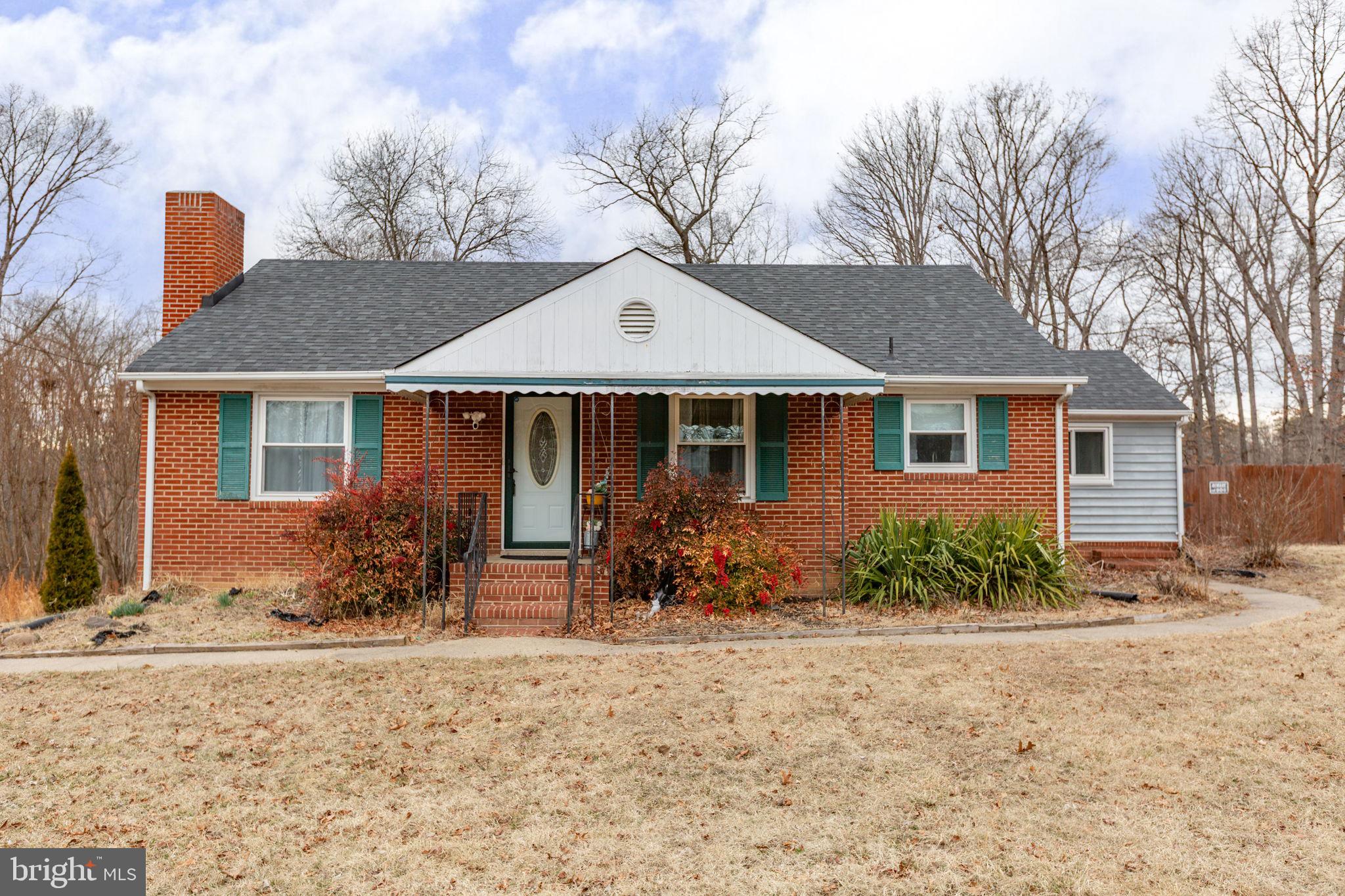 80 Ferry Road Fredericksburg, VA 22405 - Photo 39 of 39 a front view of house with yard seating and green space