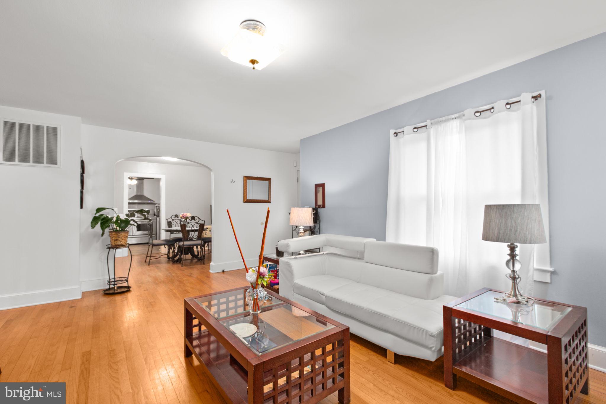 80 Ferry Road Fredericksburg, VA 22405 - Photo 4 of 39 a living room with furniture a table and wooden floor