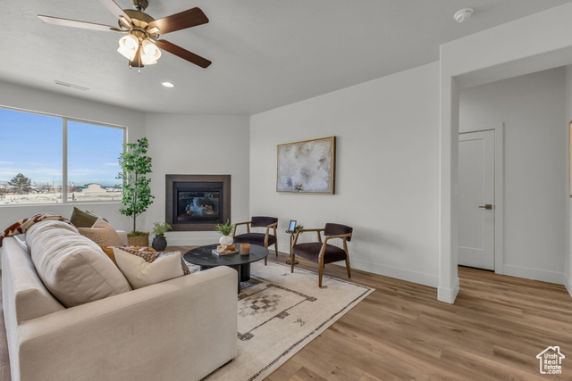 155 East 360th Street East, Unit 10B Fillmore, UT 84631 - Photo 8 of 43 Living room featuring light hardwood / wood-style flooring and ceiling fan