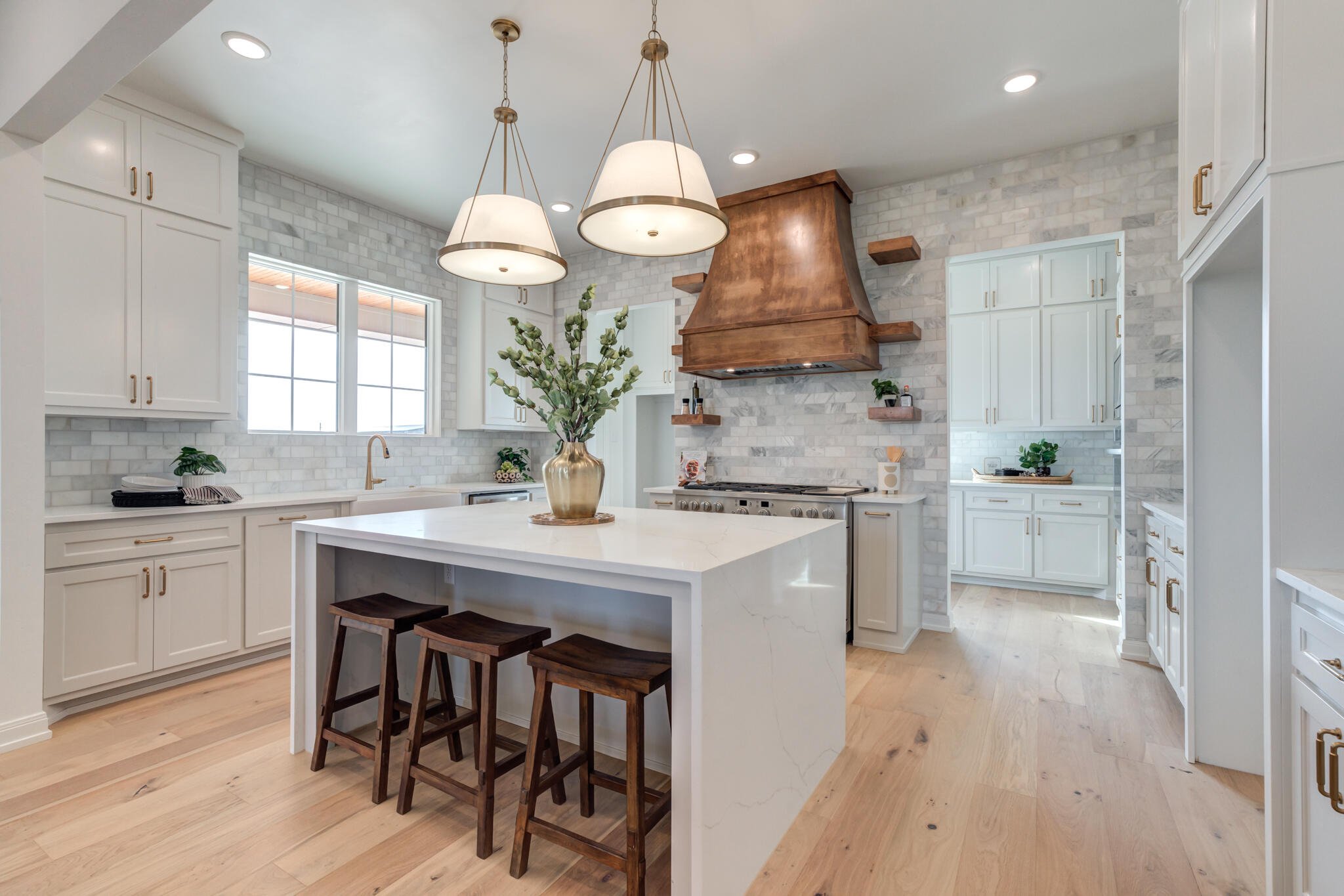 5309 County Road 7670 Lubbock, TX 79424 - Photo 12 of 53 a kitchen with a table and chairs in it