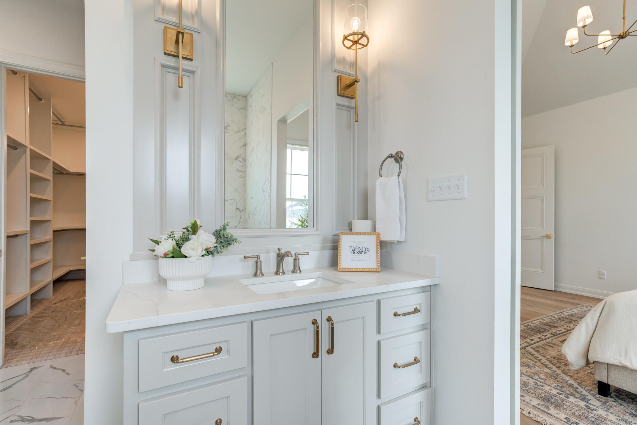 5309 County Road 7670 Lubbock, TX 79424 - Photo 23 of 53 a bathroom with a sink and a mirror