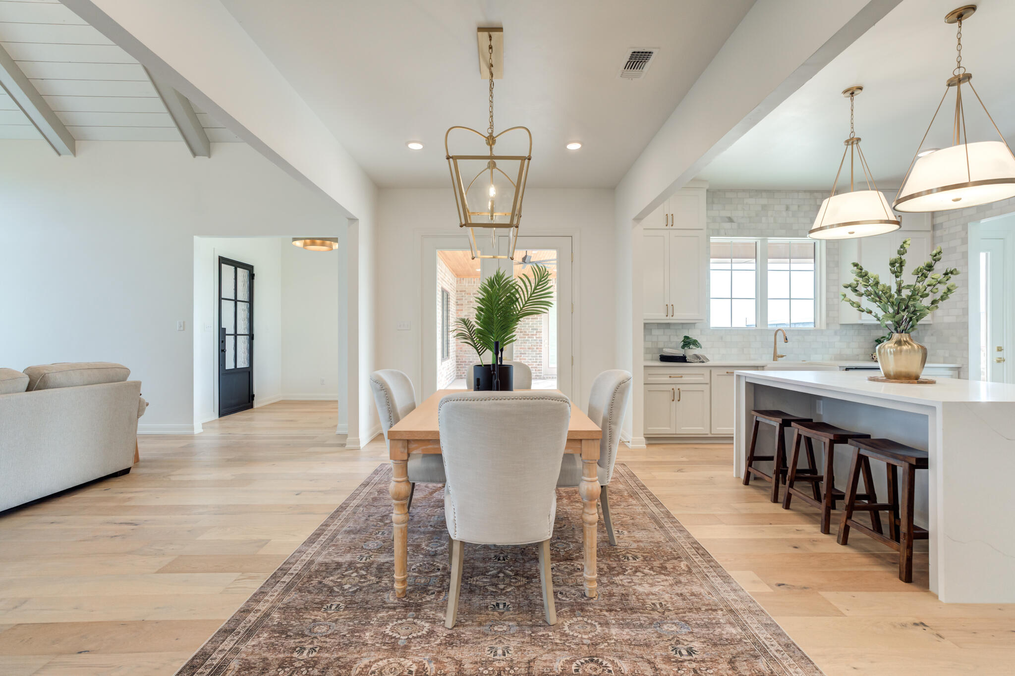 5309 County Road 7670 Lubbock, TX 79424 - Photo 45 of 53 a view of a dining room with furniture window and wooden floor