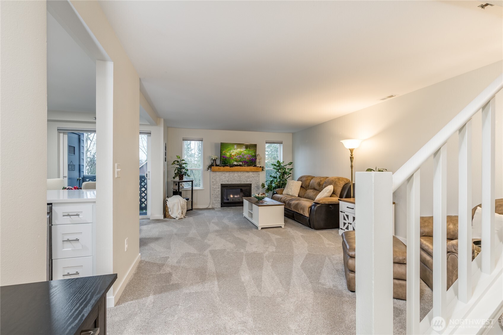 3939 10th Street Southeast, Unit B4 Puyallup, WA 98374 - Photo 11 of 25 a living room with furniture and a couch
