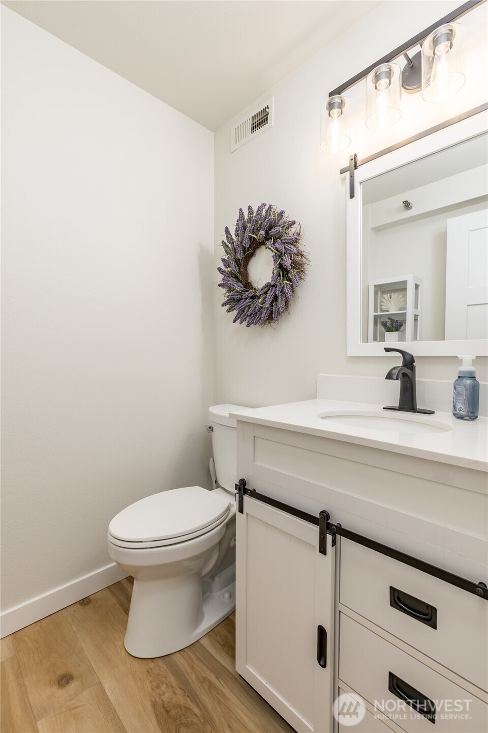 3939 10th Street Southeast, Unit B4 Puyallup, WA 98374 - Photo 13 of 25 a bathroom with a sink and a toilet