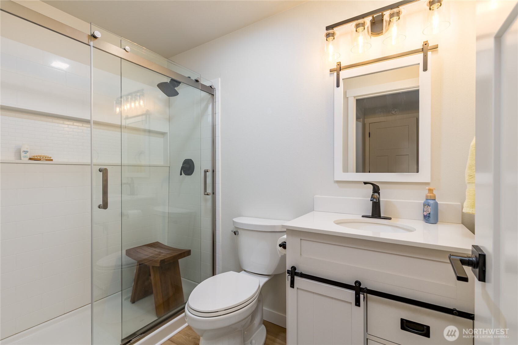3939 10th Street Southeast, Unit B4 Puyallup, WA 98374 - Photo 16 of 25 a bathroom with a sink toilet vanity and shower