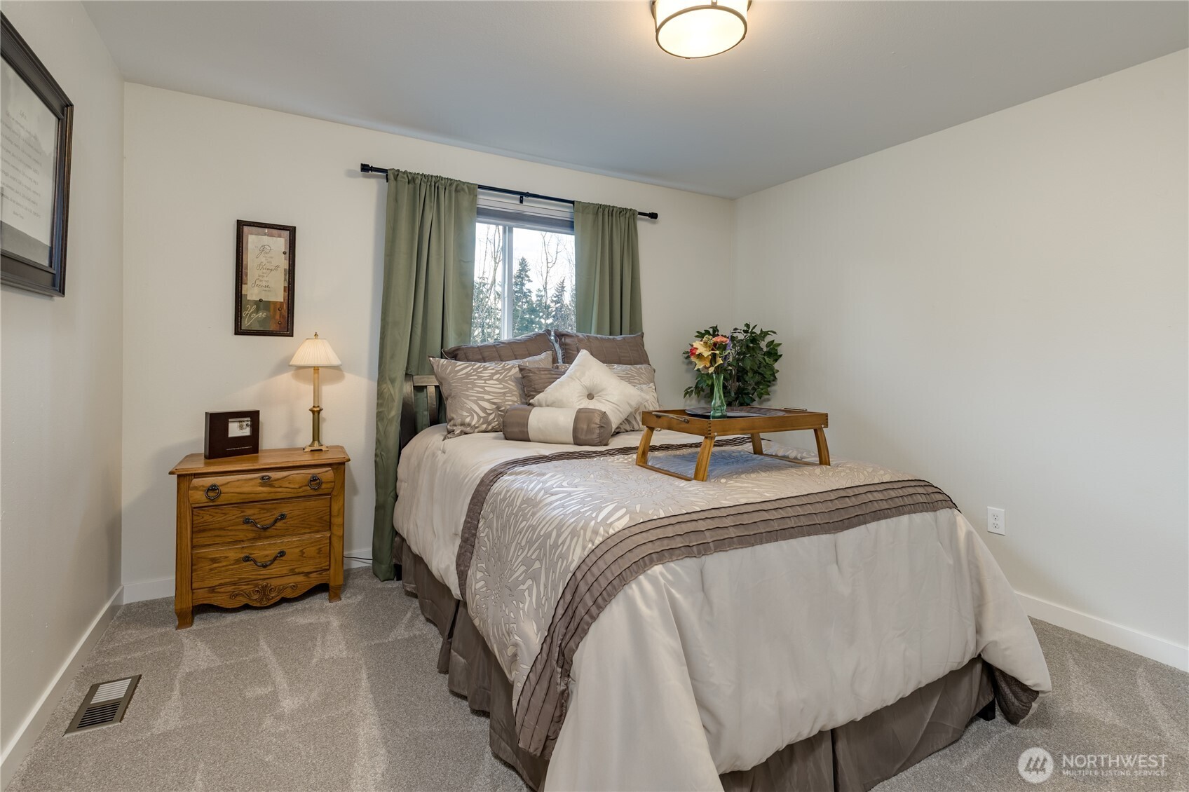 3939 10th Street Southeast, Unit B4 Puyallup, WA 98374 - Photo 17 of 25 a bedroom with a bed and window