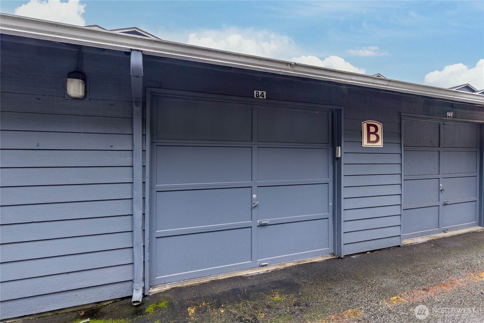 3939 10th Street Southeast, Unit B4 Puyallup, WA 98374 - Photo 23 of 25 a view of a house with a wooden fence