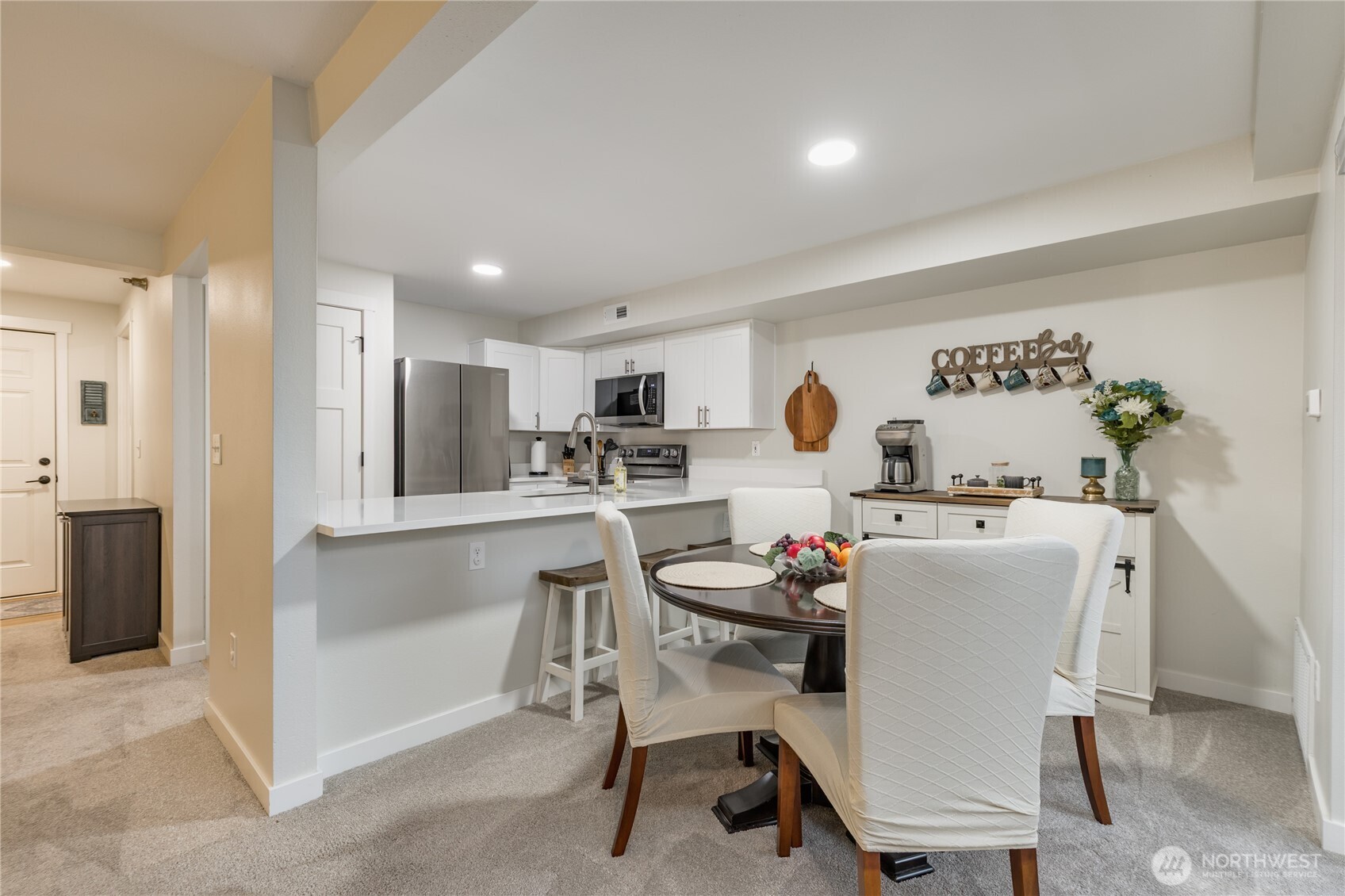3939 10th Street Southeast, Unit B4 Puyallup, WA 98374 - Photo 3 of 25 a dining room with furniture and a table