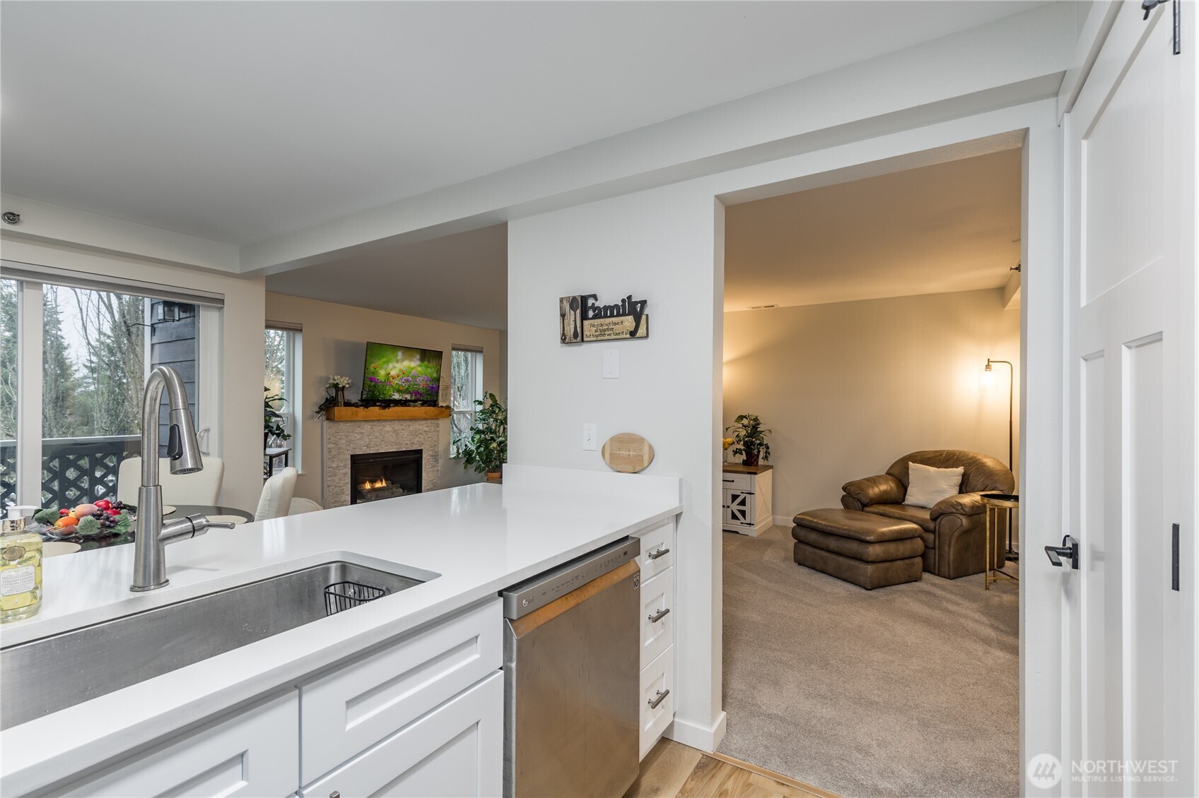 3939 10th Street Southeast, Unit B4 Puyallup, WA 98374 - Photo 8 of 25 a kitchen with a sink and a refrigerator