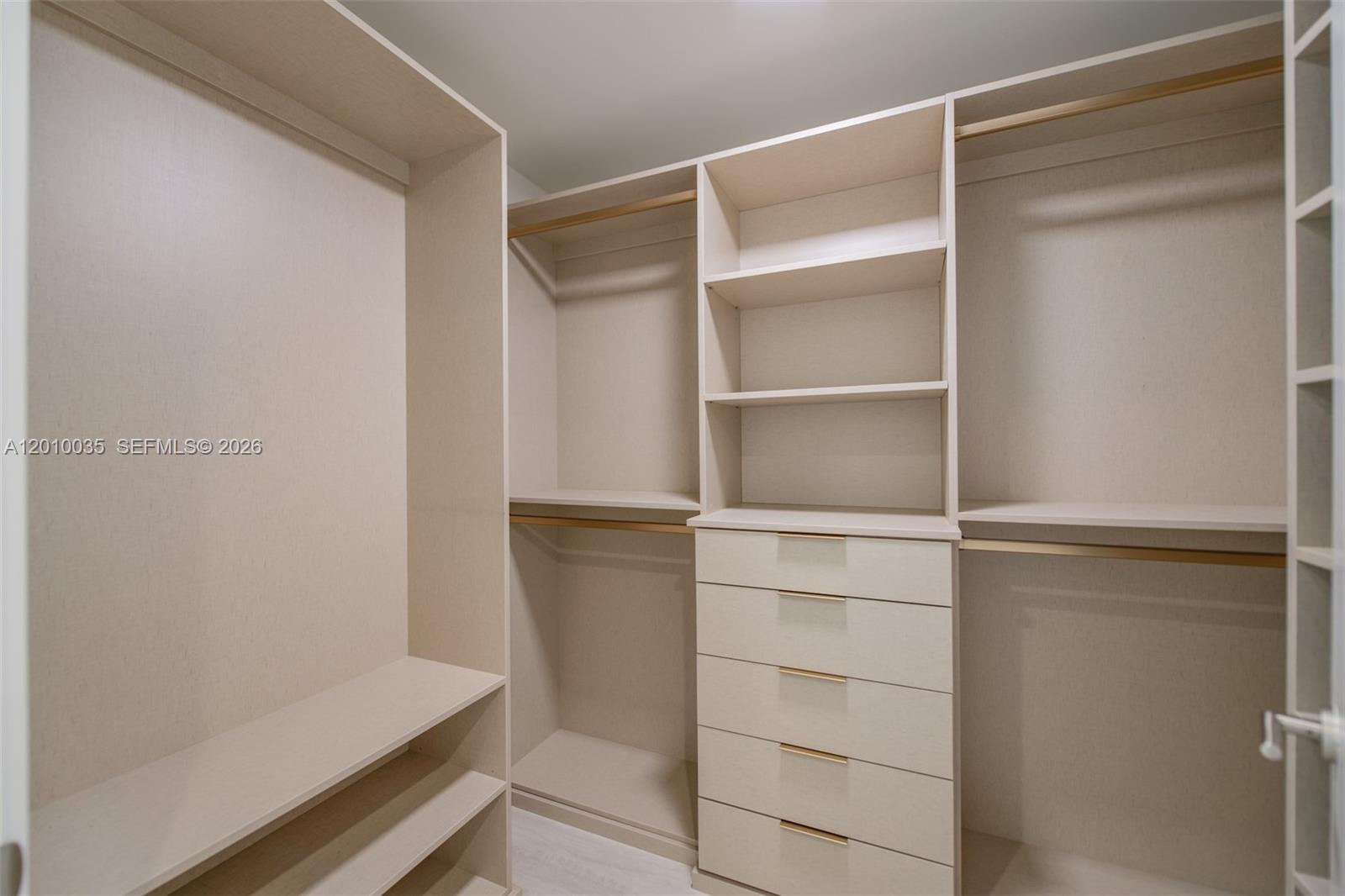 77 Southeast 5th Street, Unit 2603 Miami, FL 33131 - Photo 20 of 67 a view of an empty walk in closet