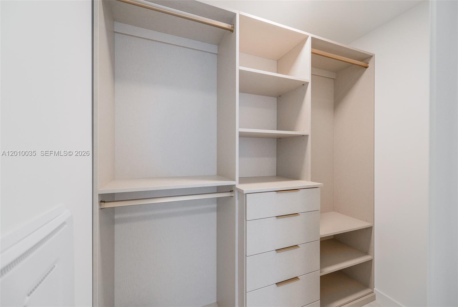 77 Southeast 5th Street, Unit 2603 Miami, FL 33131 - Photo 32 of 67 a view of an empty walk in closet