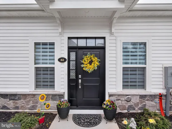 a front view of a house with outdoor space