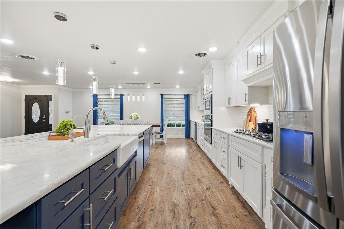 3808 61st Street Lubbock, TX 79413 - Photo 10 of 30 kitchen isle by fridge