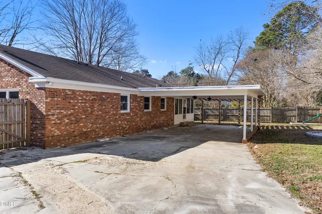a bathroom with a bathtub and a toilet
