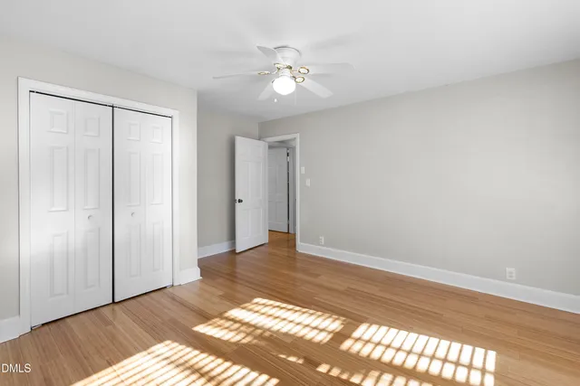 a kitchen with stainless steel appliances granite countertop wooden cabinets a stove top oven and granite counter tops