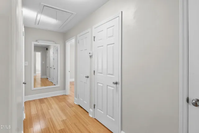 a kitchen with granite countertop a sink stainless steel appliances and cabinets
