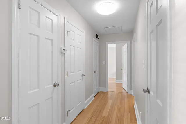 a view of a kitchen counter top a sink and a window