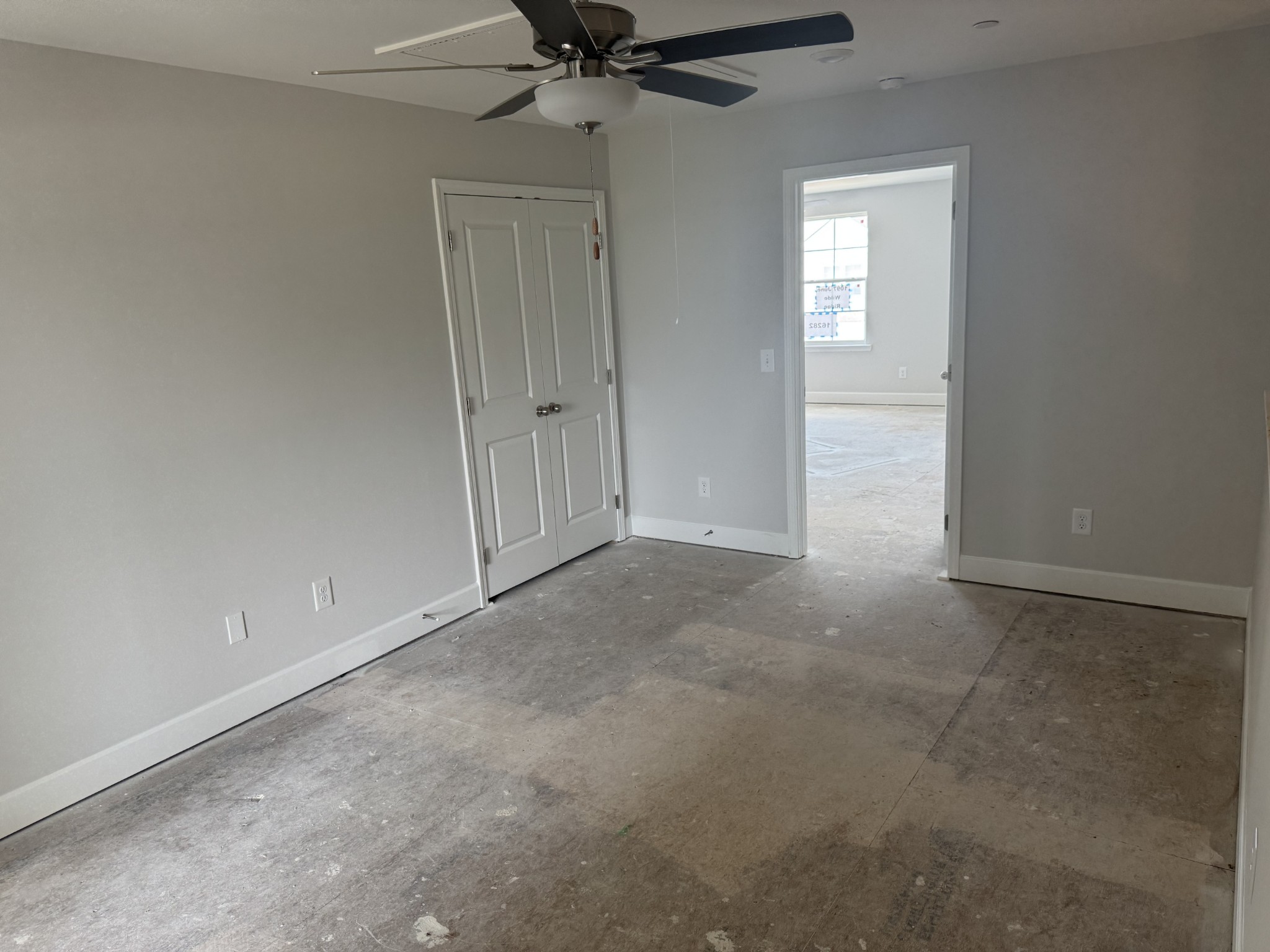 1097 June Wilde Ridge Spring Hill, TN 37174 - Photo 5 of 15 a view of an empty room and a ceiling fan