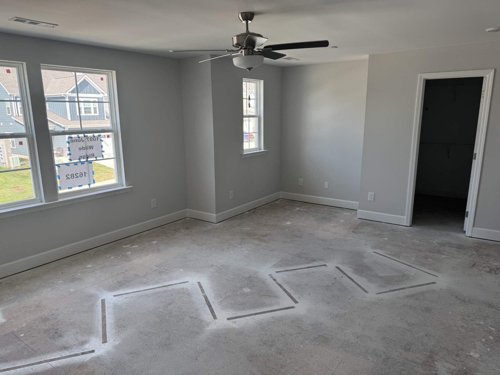 1097 June Wilde Ridge Spring Hill, TN 37174 - Photo 8 of 15 an empty room with windows and ceiling fan