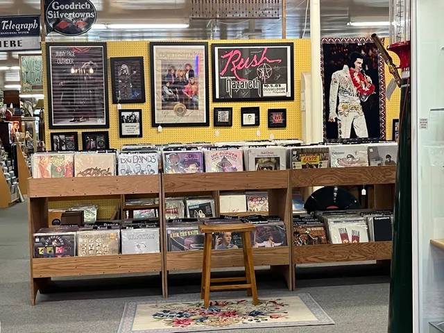 a room with furniture pool table and flat screen tv