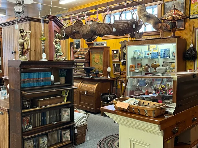 a kitchen with stainless steel appliances a sink and cabinets