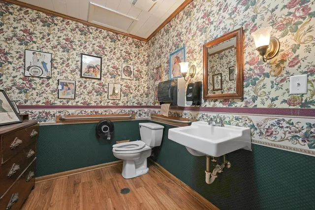 a living room with lots of furniture and a chandelier