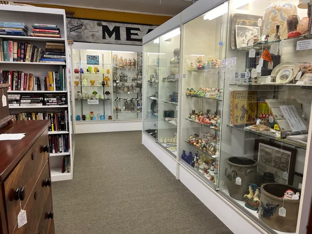a living room with furniture a rug and a chandelier