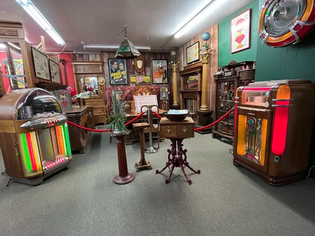 a bathroom with a sink mirror vanity and toilet