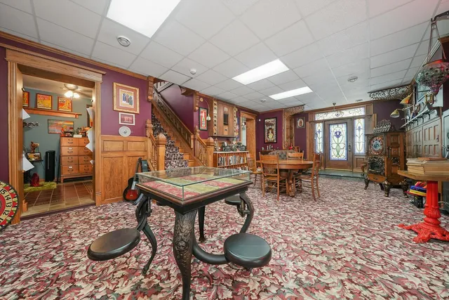 a living room filled with furniture and decor