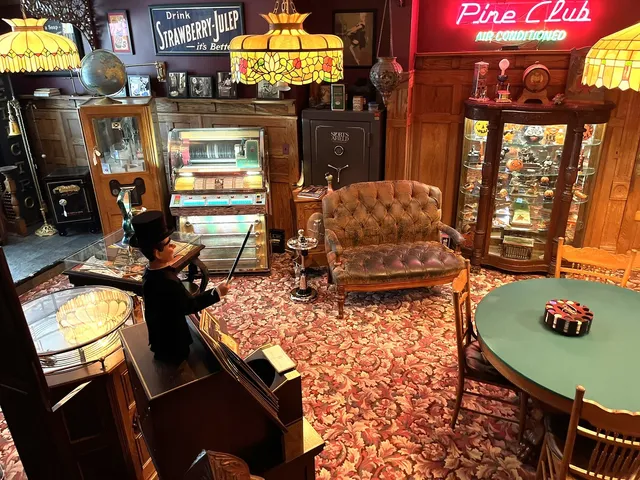 a view of a chairs and tables in a patio