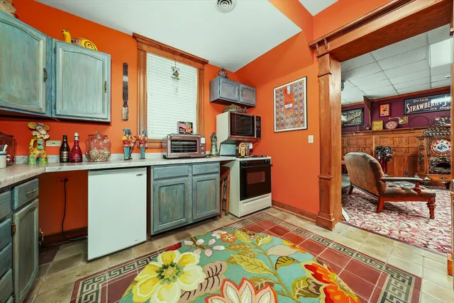 a view of a chairs and table in a room