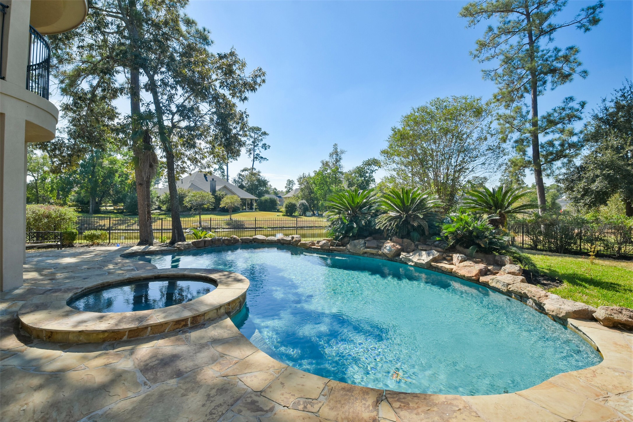 8114 Hideaway Lake Circle Spring, TX 77389 - Photo 40 of 50 a view of a swimming pool in a yard