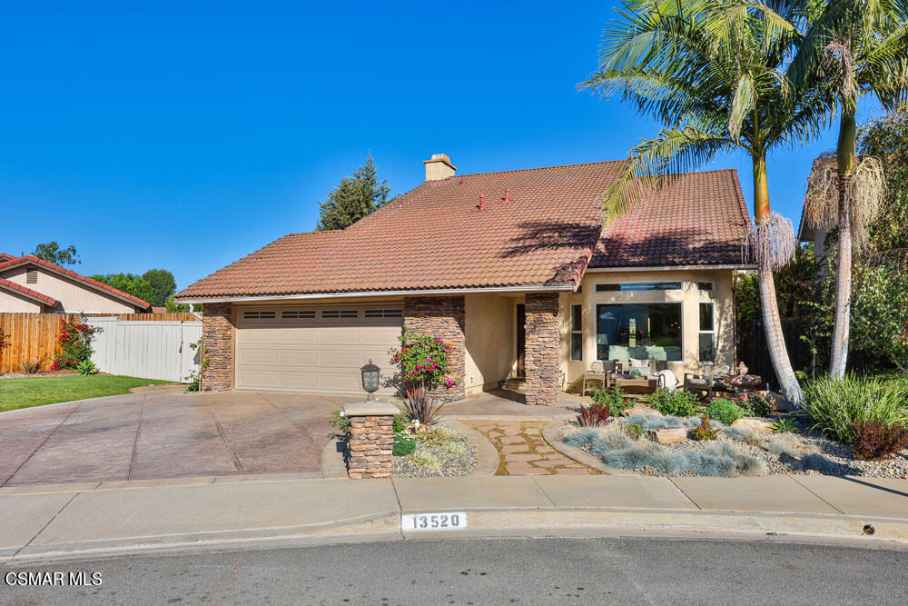 13520 Bear Valley Road Moorpark, CA 93021 - Photo 1 of 53 front view of a house with a yard