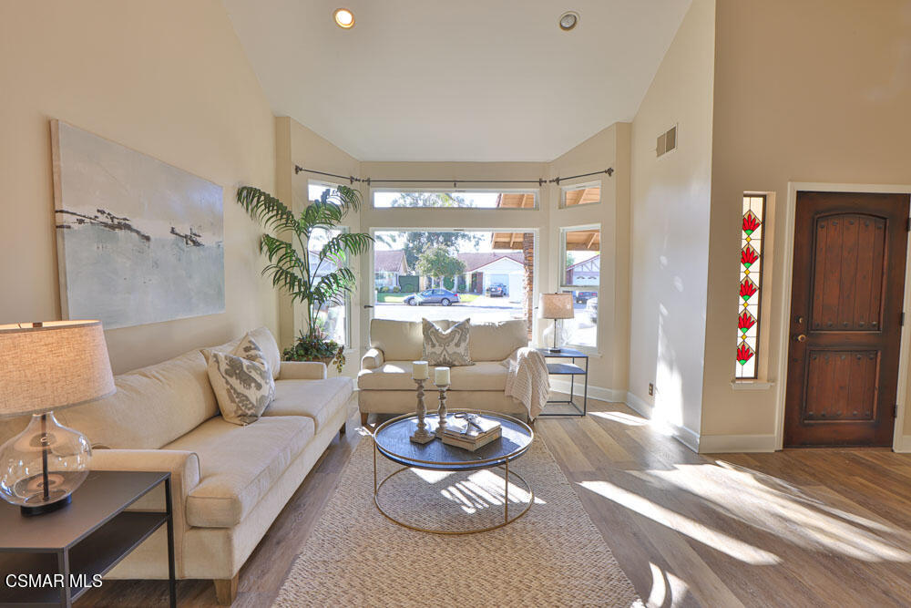 13520 Bear Valley Road Moorpark, CA 93021 - Photo 12 of 53 a living room with furniture and a large window