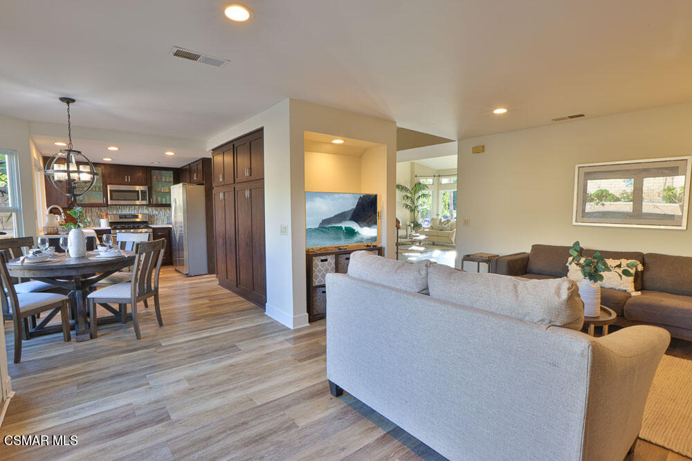 13520 Bear Valley Road Moorpark, CA 93021 - Photo 20 of 53 a living room with furniture and a large window