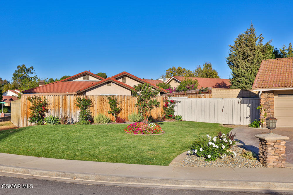 13520 Bear Valley Road Moorpark, CA 93021 - Photo 4 of 53 a view of a backyard with a garden and entertaining space