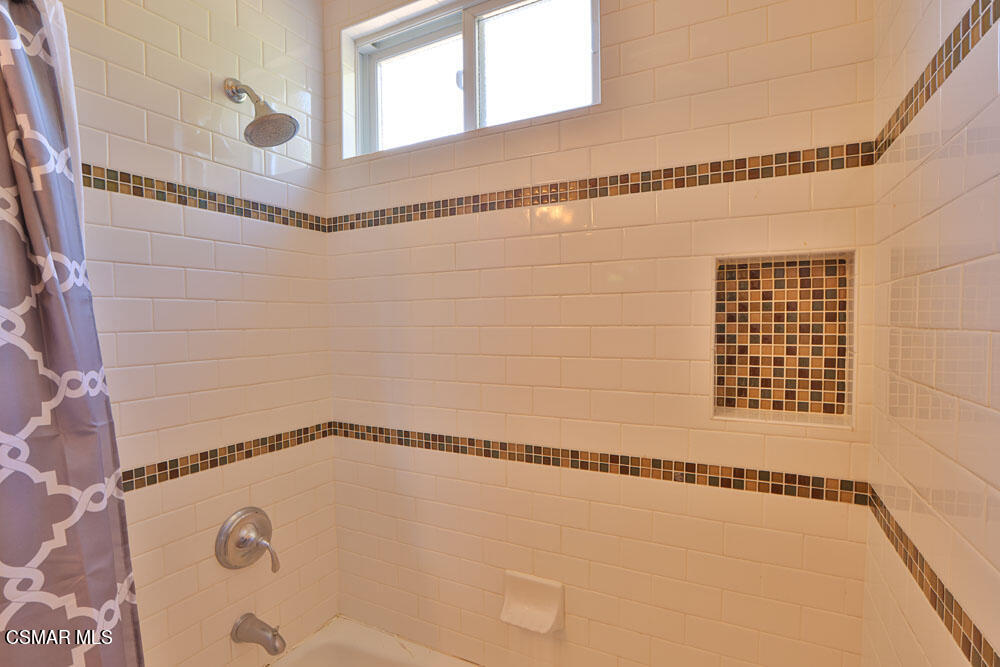 13520 Bear Valley Road Moorpark, CA 93021 - Photo 38 of 53 a bathroom with a shower