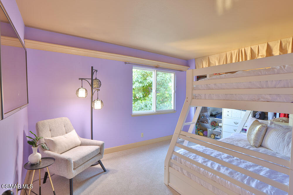 13520 Bear Valley Road Moorpark, CA 93021 - Photo 40 of 53 a bedroom with a bed and a window
