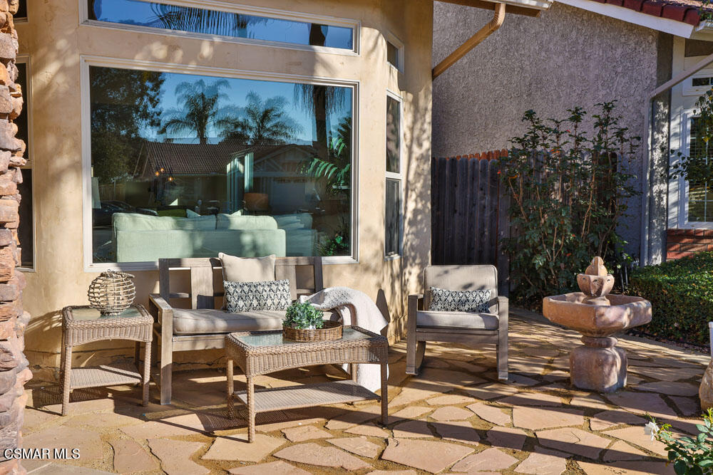 13520 Bear Valley Road Moorpark, CA 93021 - Photo 7 of 53 a view of a patio with couple of chairs and potted plants