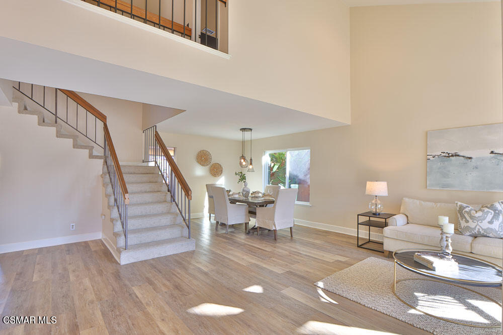 13520 Bear Valley Road Moorpark, CA 93021 - Photo 10 of 53 a living room with furniture and a wooden floor